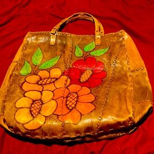 aVintage 70’s all leather satchel bag